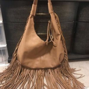 Carlos Santana purse with fringe